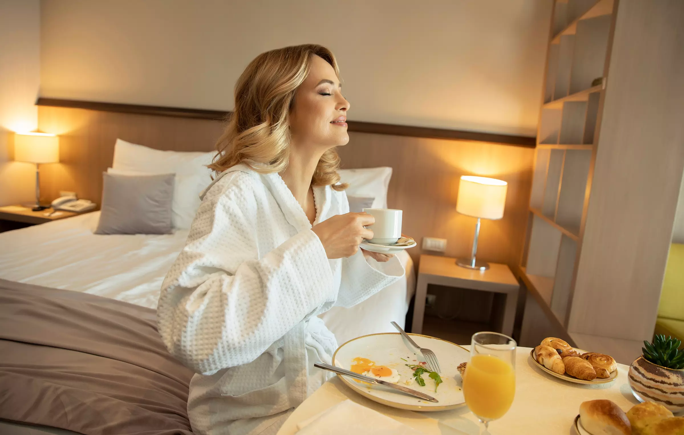 person-eating-breakfast-in-room